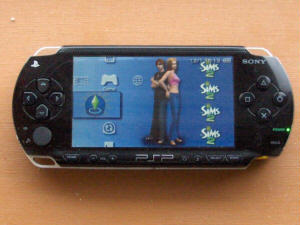 PSP with Sims 2 title screen