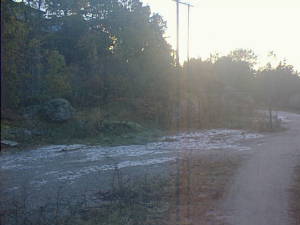 Snow on ground in yellow sunlight